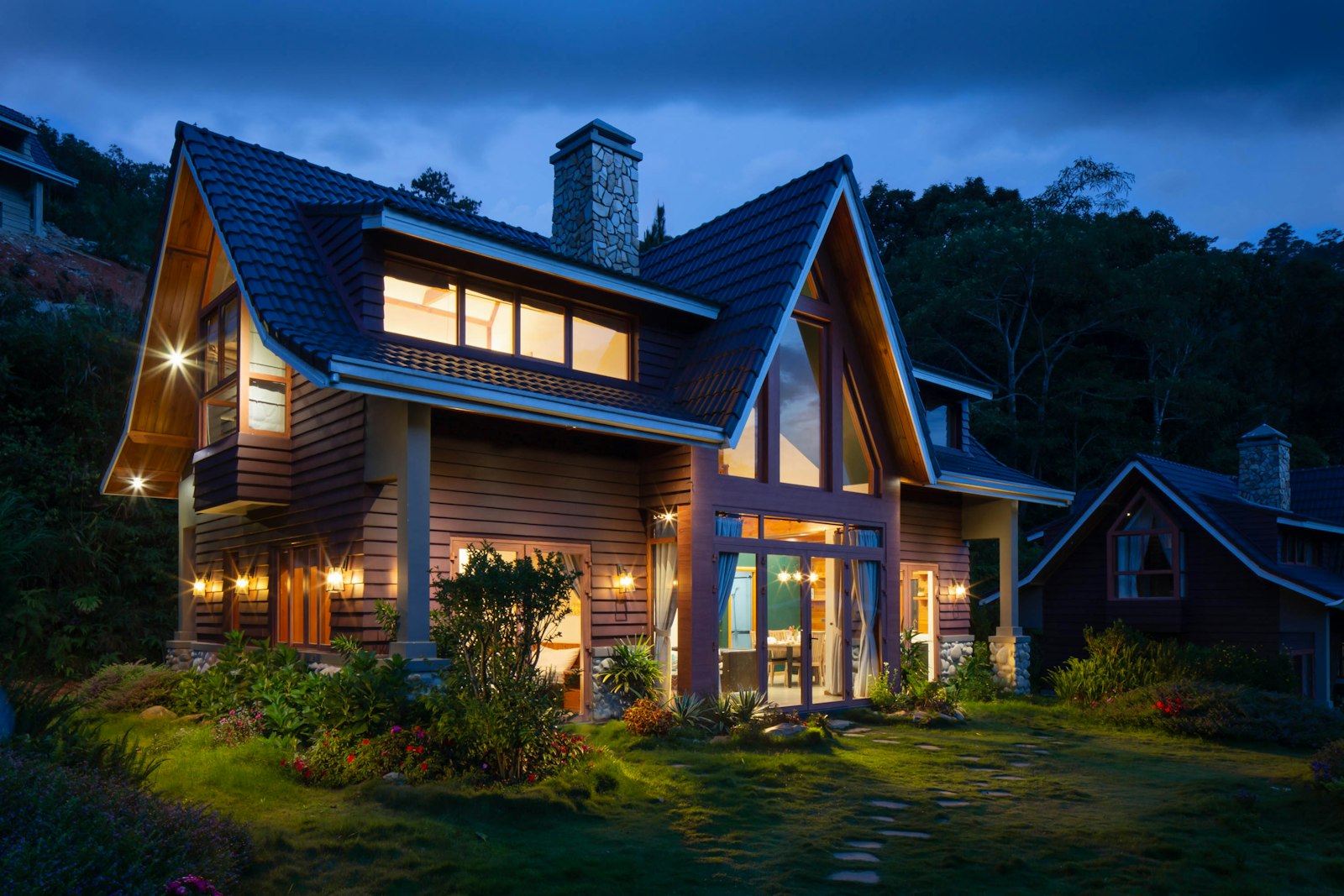 Custom residence with dramatic evening lighting